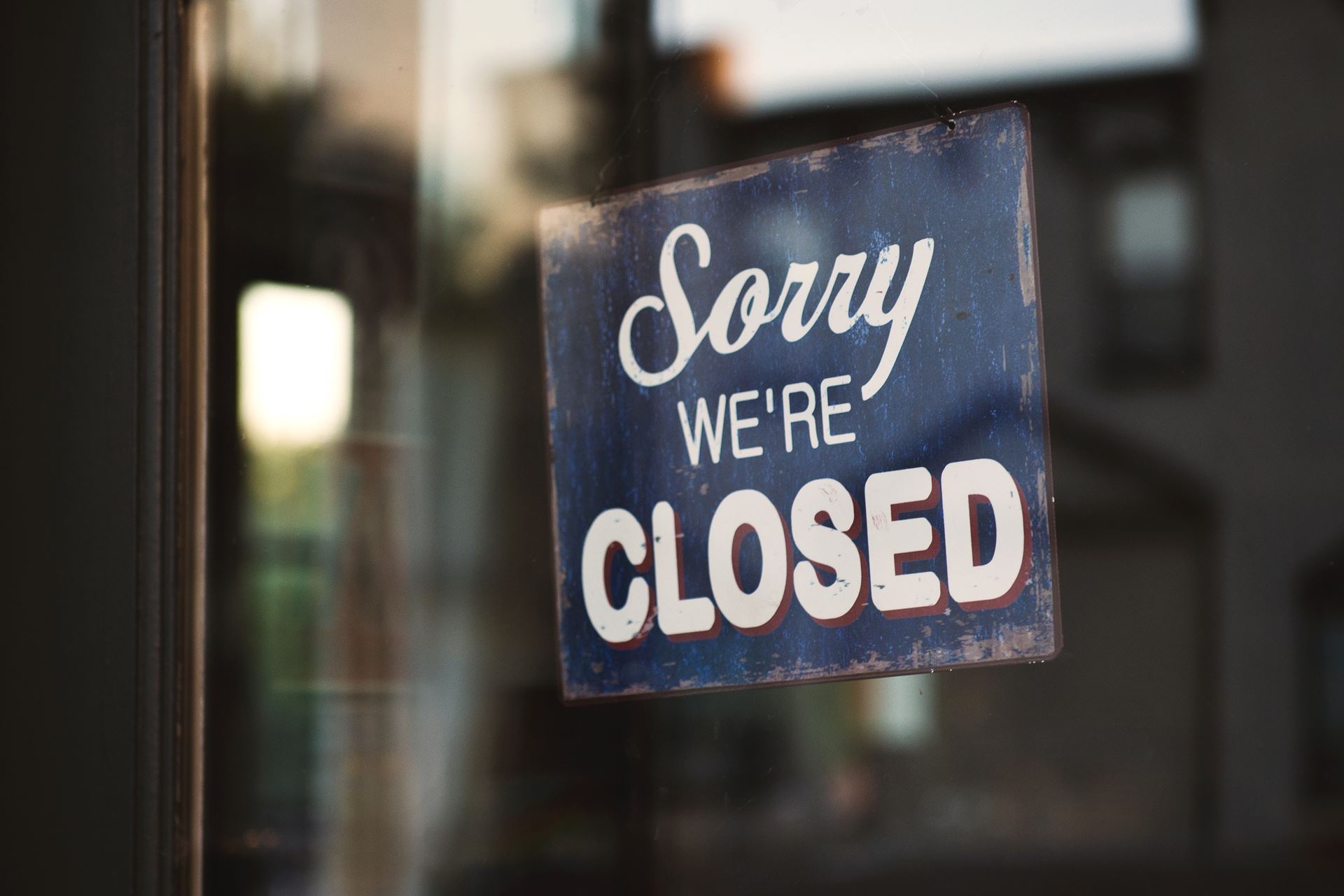 a close up of a closed sign